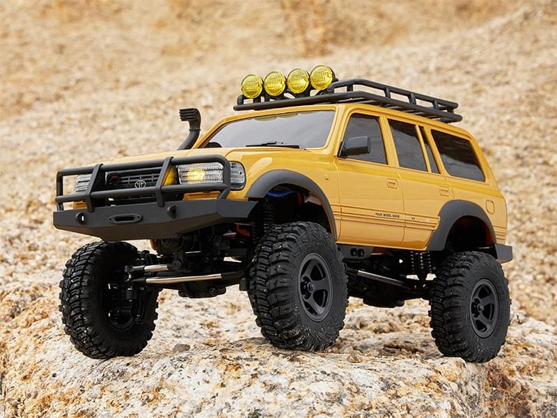 Crawler FMS 1/18 Toyota LC80 jaune FCX18 Prêt à rouler 11831 RTR - Breizh Modélisme.