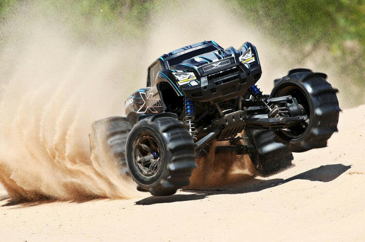 2 pneus et jantes Paddle Traxxas XMaxx 7773 - Breizh Modélisme.
